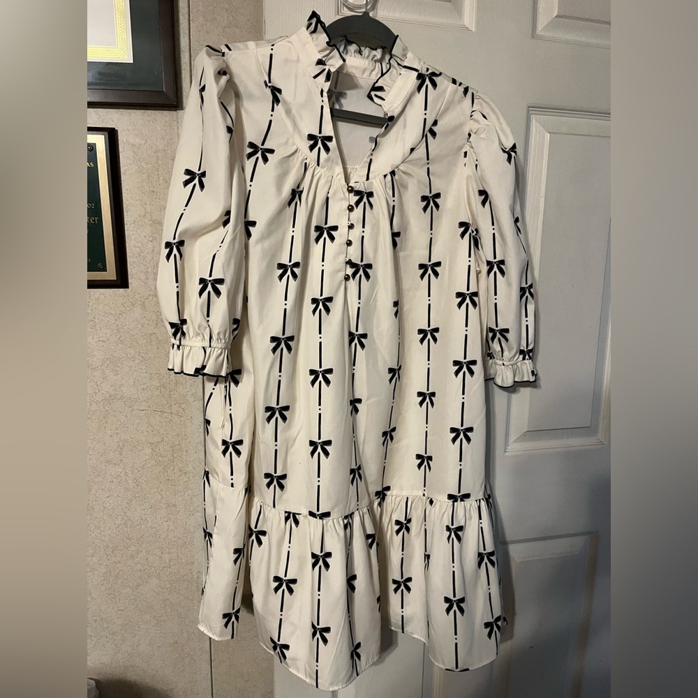 White Dress with Black Bow Pattern